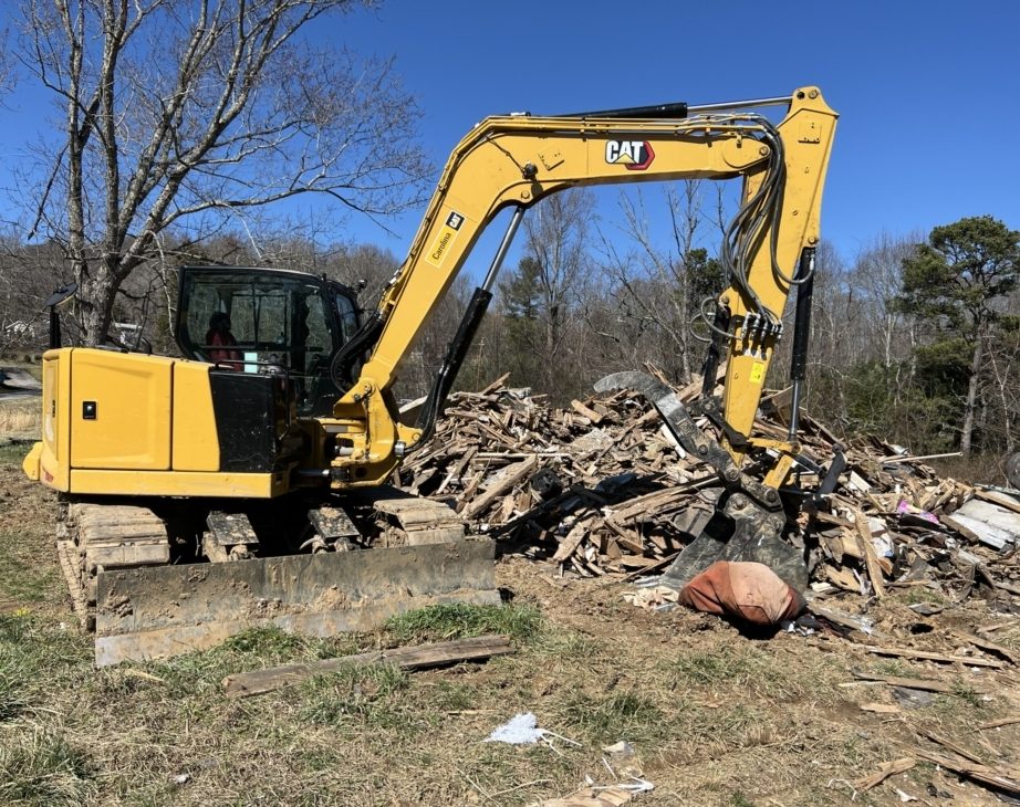 A machine performing demolition.