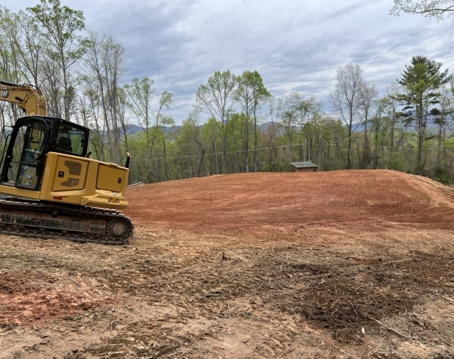 A machine performing land clearing